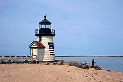 Fishing Off The Beach By Nantucket Island Lighthouse